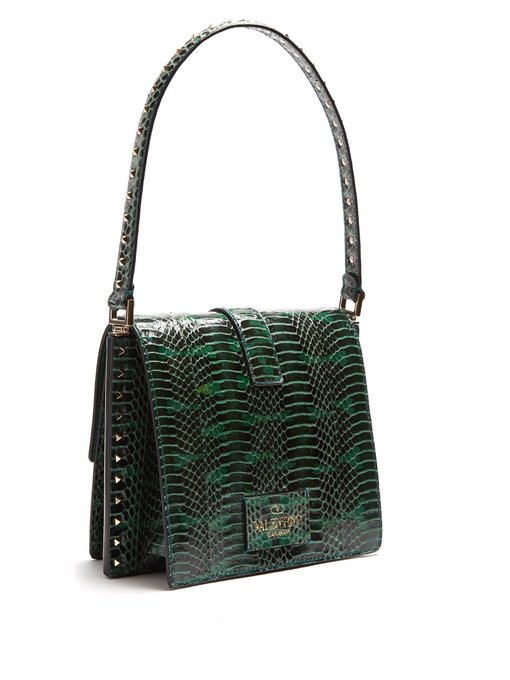 Rockstud-embellished snakeskin bag | Valentino Garavani | MATCHESFASHION UK