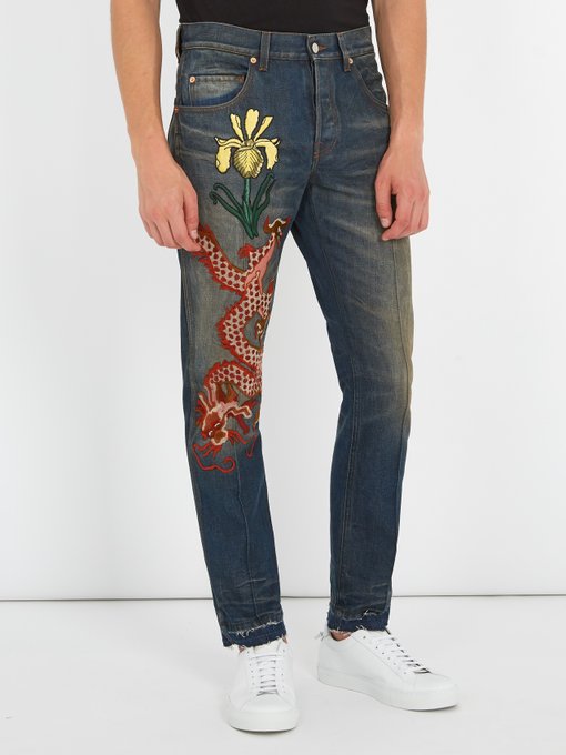 Dragon-embroidered appliqué jeans | Gucci | MATCHESFASHION UK