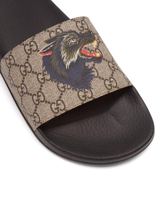 gucci gg supreme slides with wolf
