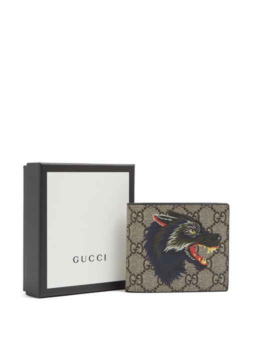 GG Supreme wolf-print wallet | Gucci | MATCHESFASHION.COM US