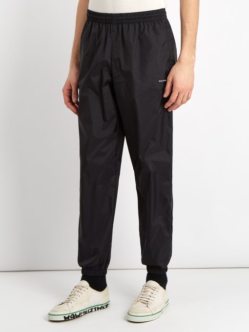 Lightweight logo-print track pants | Balenciaga | MATCHESFASHION.COM US
