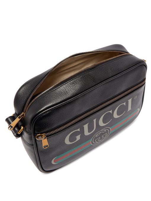 Logo-print leather messenger bag | Gucci | MATCHESFASHION.COM UK
