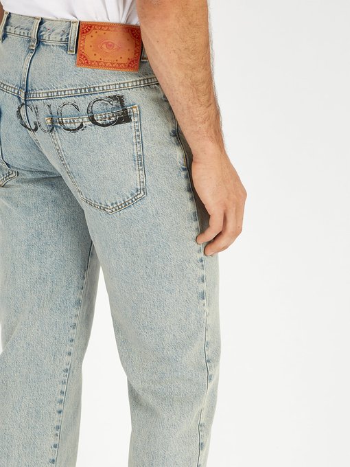 Logo-print straight-leg jeans | Gucci 