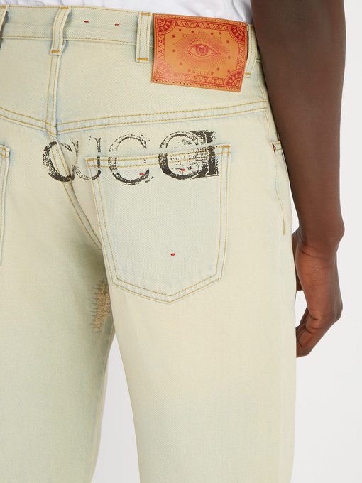 gucci logo jeans