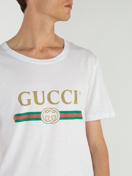 Fake logo-print cotton T-shirt | Gucci | MATCHESFASHION UK