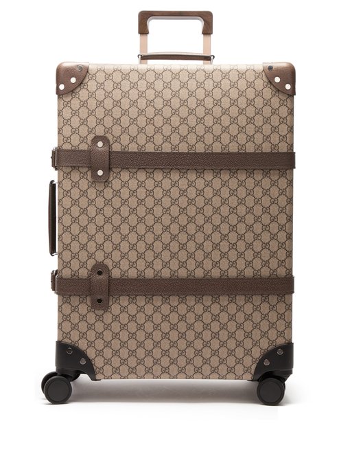 gucci supreme suitcase