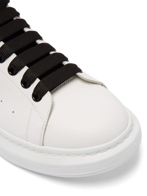 Raised-sole low-top leather trainers 