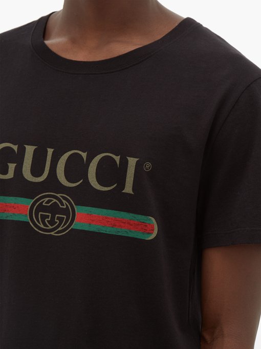 real vs fake gucci shirt