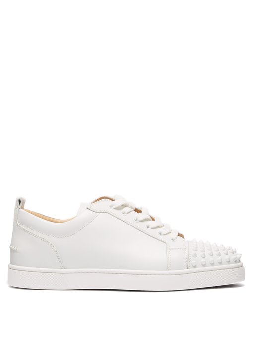 white leather louboutin trainers