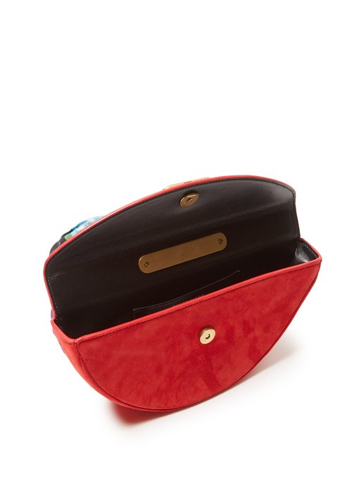 red suede clutch bag