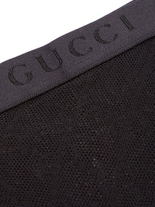 GG-jacquard fishnet tights | Gucci | MATCHESFASHION US