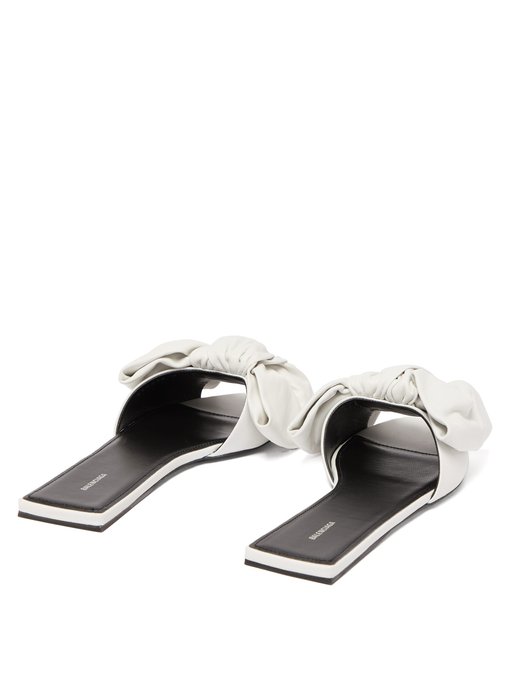 white slides with bow