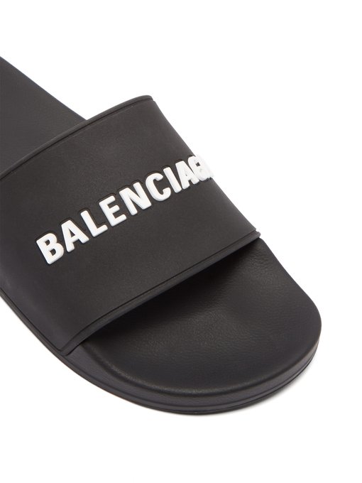 Logo-embossed rubber slides | Balenciaga | MATCHESFASHION UK