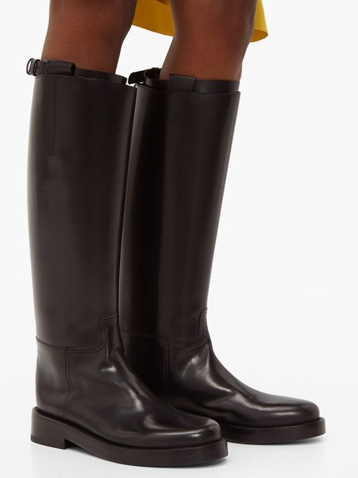 black leather knee high riding boots