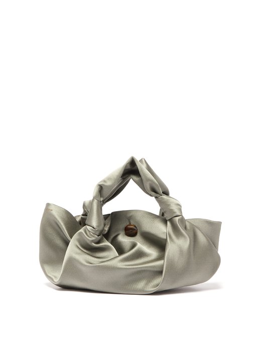 grey shoes and clutch bag