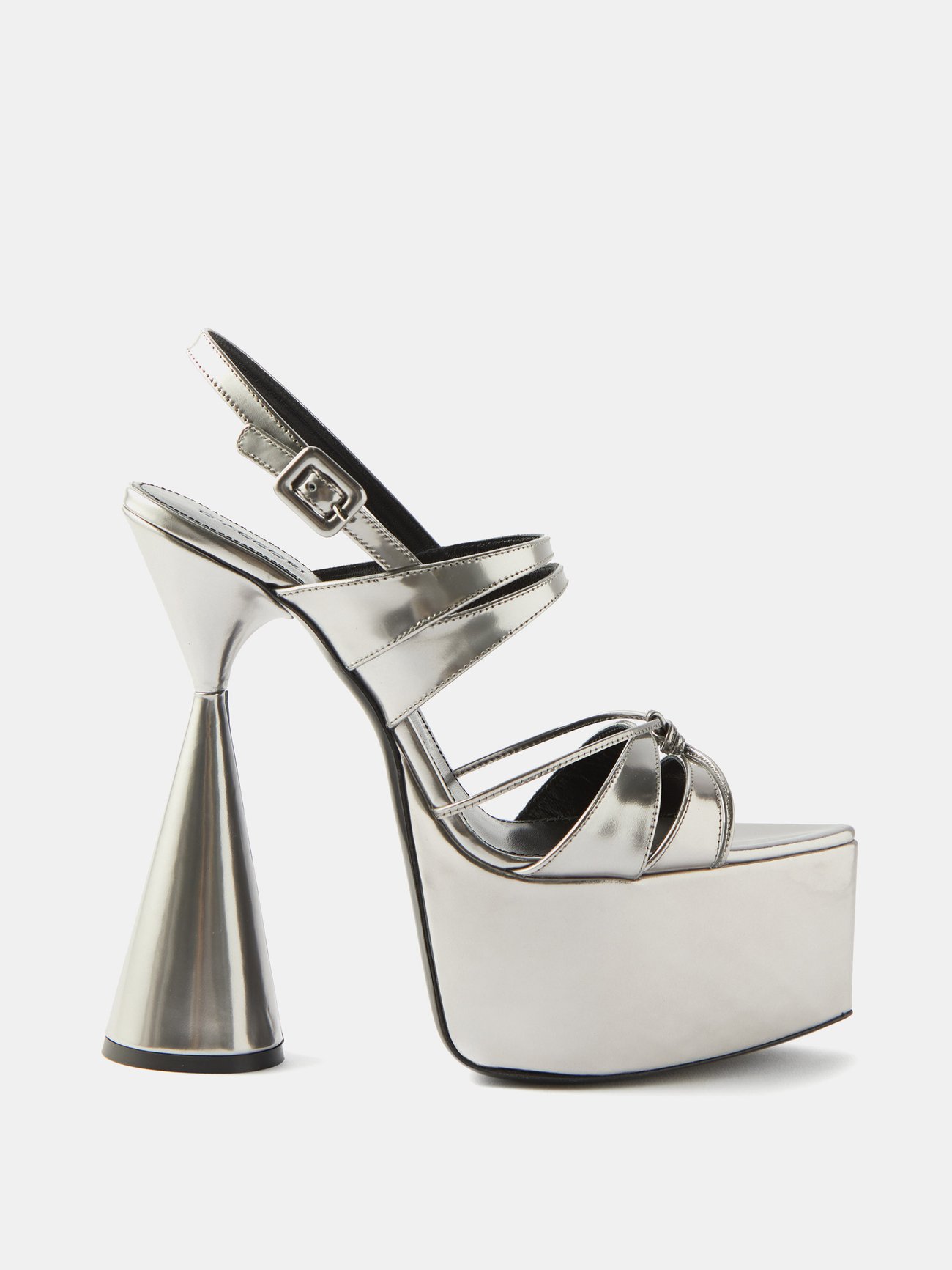 These new for SS22 D’ACCORI silver Belle platform sandals are Italian-made from leather with a unique towering cone heel and pointed platform toe. The foot is supported by multiple straps over the toe and arch and an adjustable strap around the back of the ankle. 