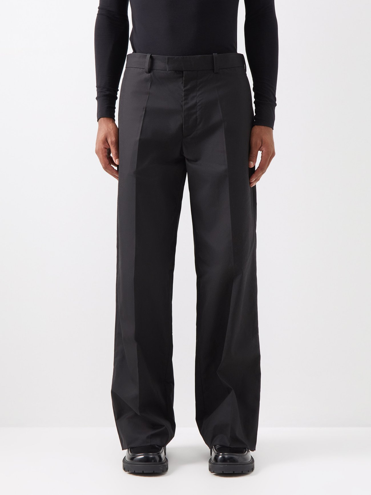 Black Pressed-crease cotton trousers | Raf Simons | MATCHESFASHION AU