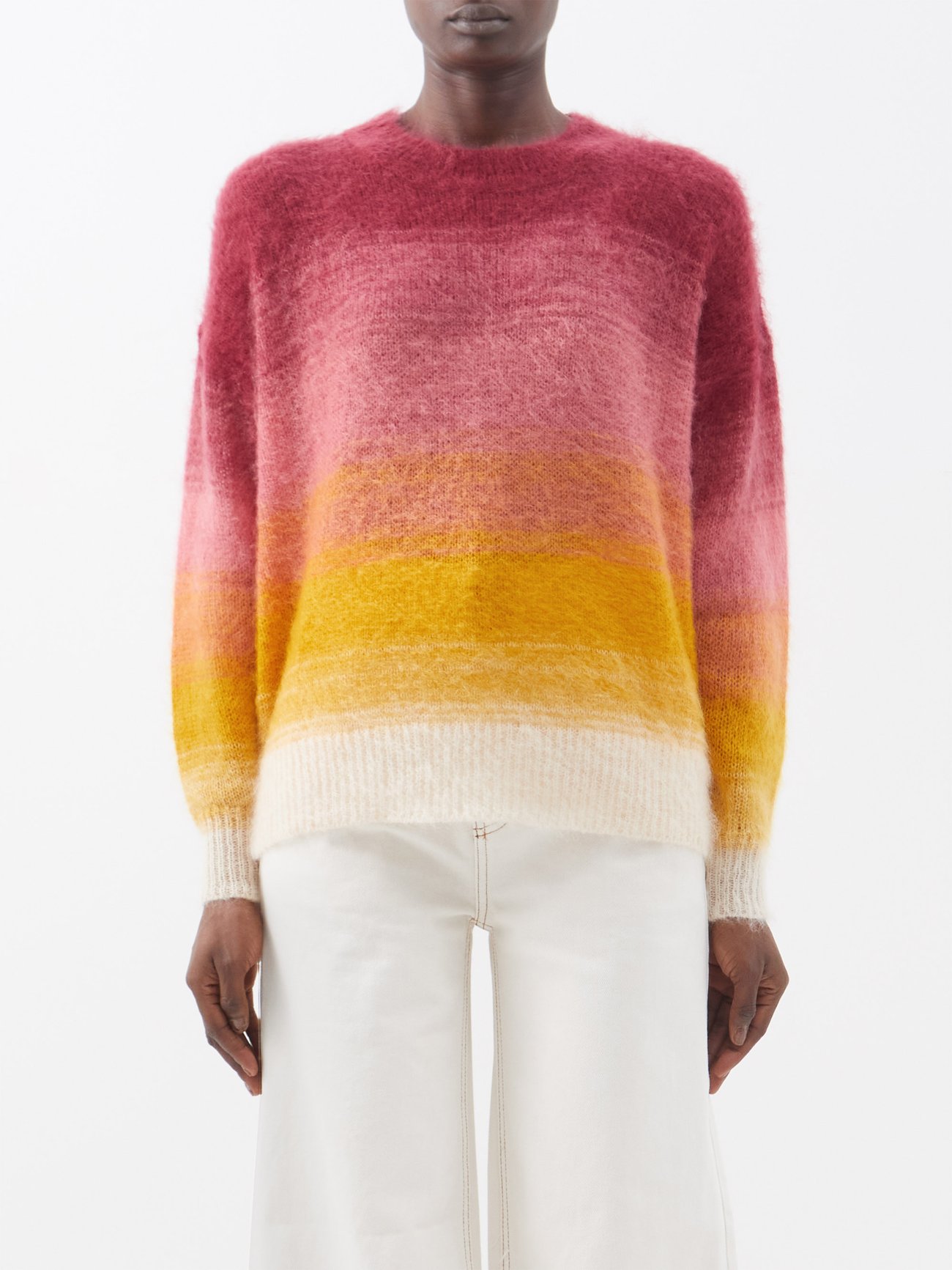 Isabel Marant's Drussell sweater is made in Italy and knitted from a mohair blend, giving a soft-focus fuzz to the warm pink and yellow dégradé hues.