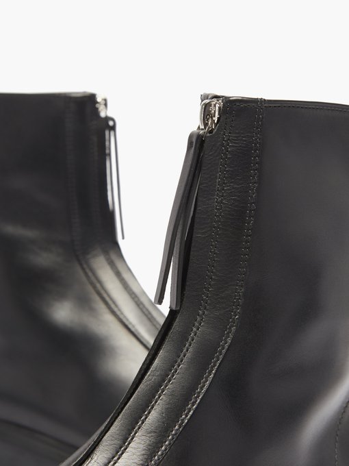 black zip front ankle boots