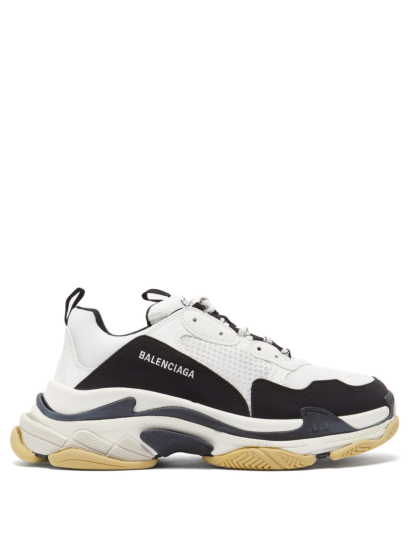 Balenciaga Triple S low top trainers $850 liked on Polyvore
