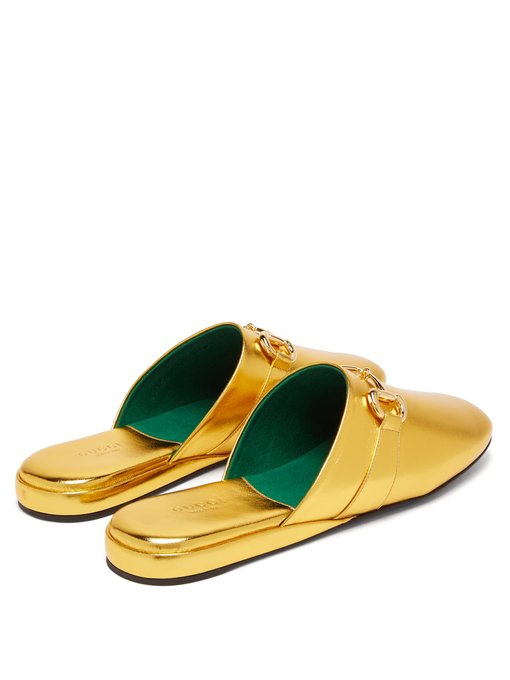 gold gucci loafers