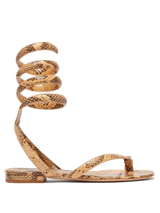 Python-embossed leather sandals by Bottega Veneta, available on matchesfashion.com for $62375 Kourtney Kardashian Shoes SIMILAR PRODUCT
