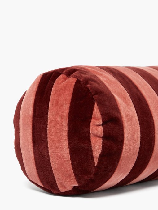 red bolster cushion