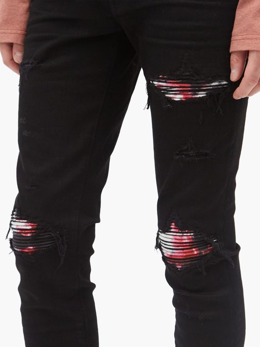 black and red amiri jeans