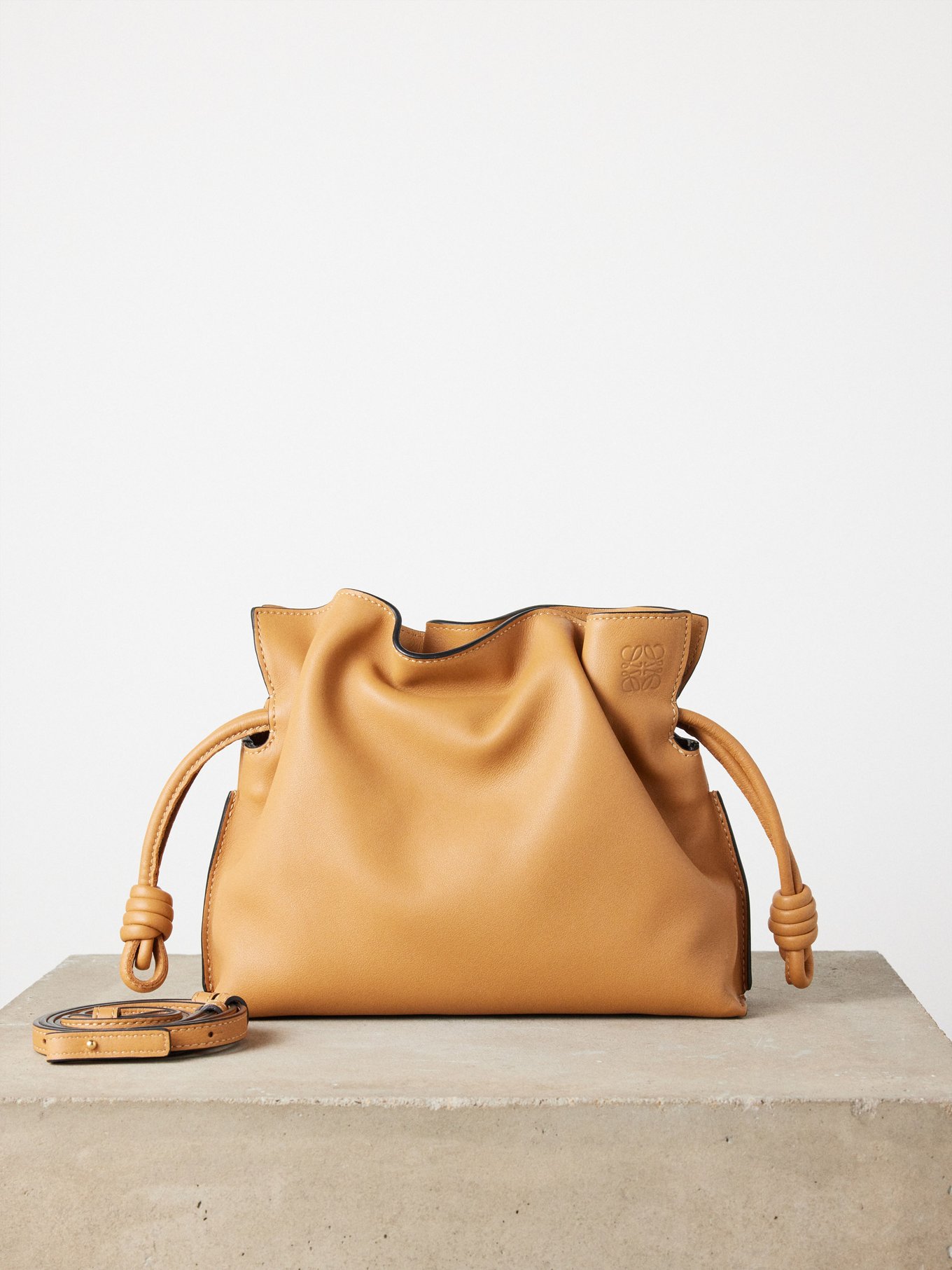 Tan Flamenco mini leather clutch bag | LOEWE | MATCHESFASHION US