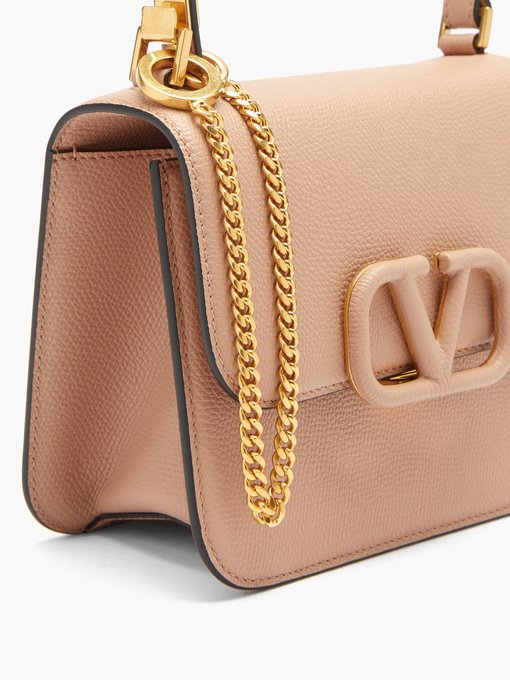 V-sling small leather shoulder bag | Valentino Garavani | MATCHESFASHION US