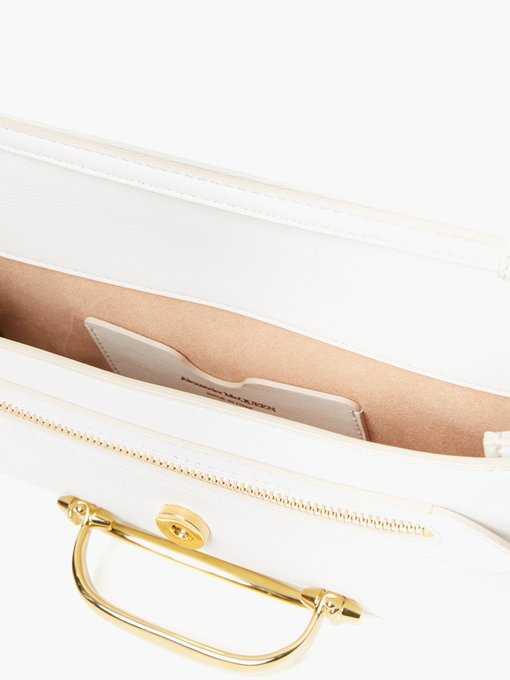 small beige clutch bag