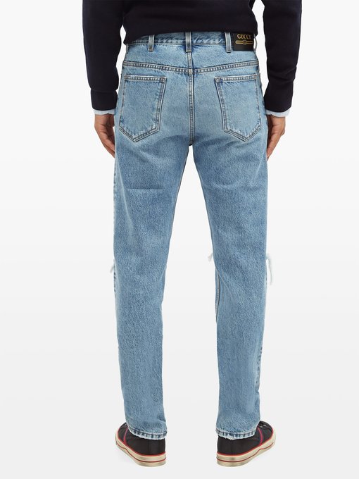 Ripped straight-leg jeans | Gucci | MATCHESFASHION UK