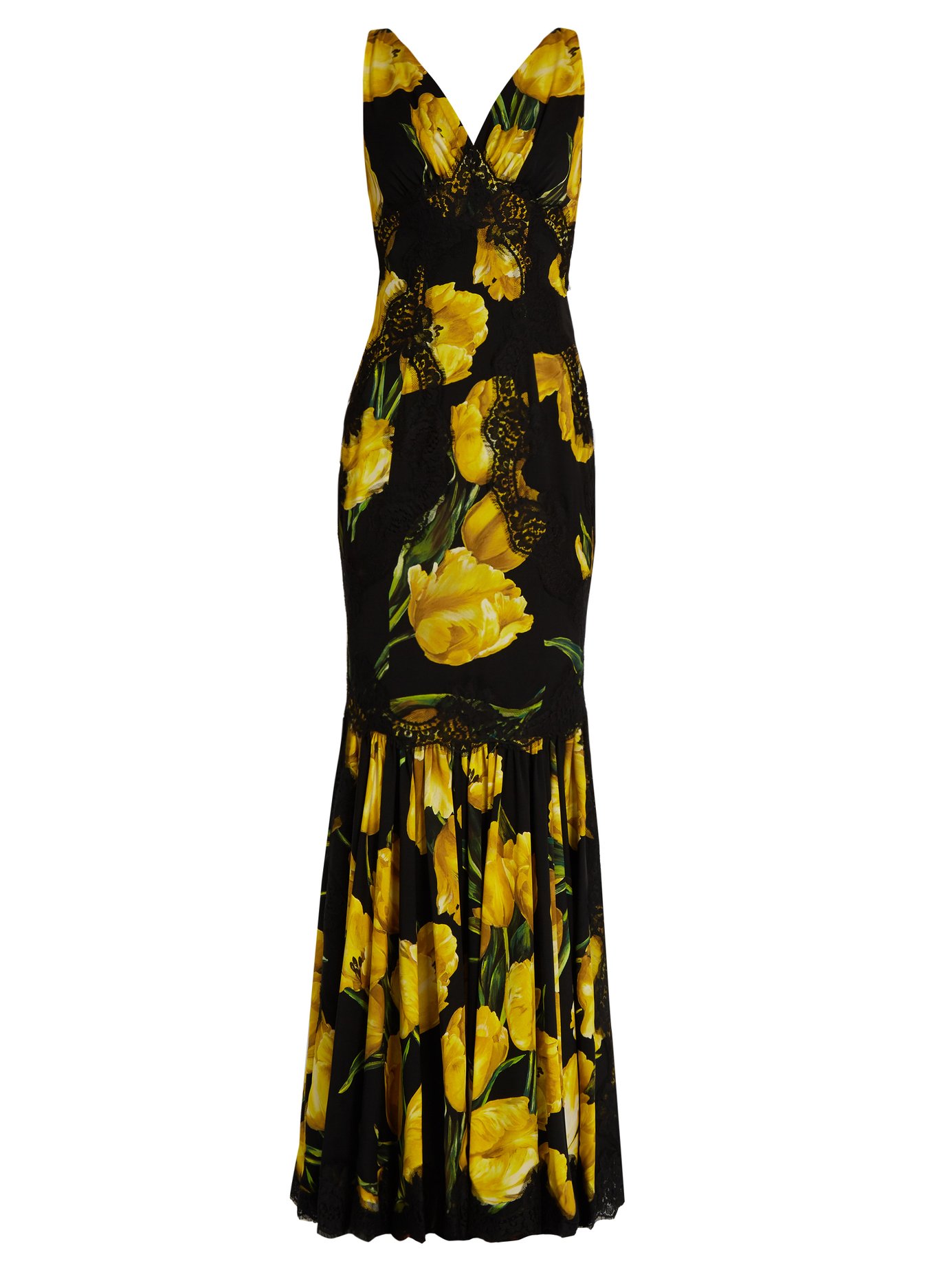 La Dolce Vita silhouettes and artistic prints collide in Dolce & Gabbana's eveningwear. This black silk-blend charmeuse gown is carefully cut to a mermaid-like silhouette that's enlivened with a painterly yellow tulip print and enhanced by contouring black floral-lace inserts. Let the dramatic fluted skirt swish playfully over seductive stilettos.
