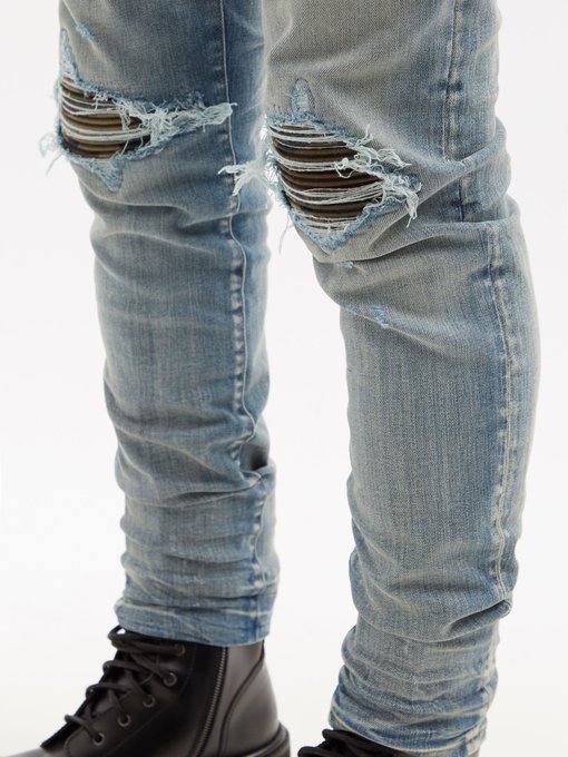 MX1 camouflage-patch slim-leg jeans | Amiri | MATCHESFASHION UK