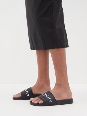 26 % de réduction Claquettes en caoutchouc à imprimé logo Givenchy en coloris Noir Femme Chaussures plates Chaussures plates Givenchy 