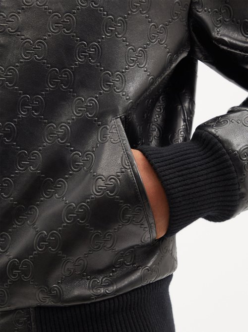 Black GG-embossed leather bomber jacket, Gucci