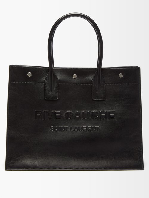 Saint Laurent Rive Gauche-debossed Leather Tote Bag In Black