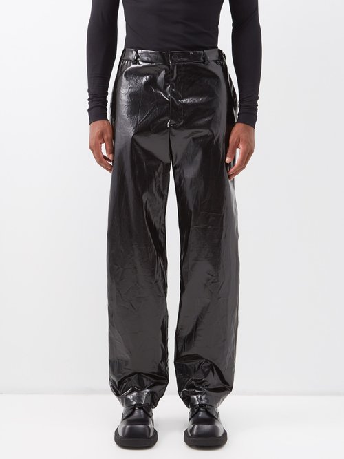 Balenciaga Crinkled Coated Cotton-blend Trousers In Black | ModeSens