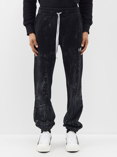 Amiri Cracked Dye Logo Sweatpants In Black | ModeSens