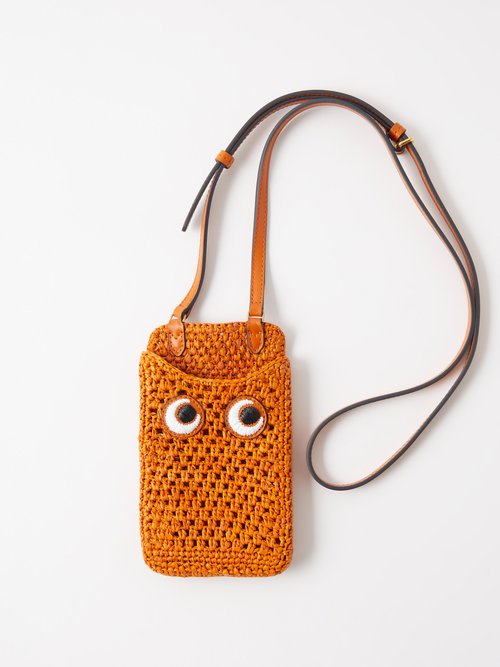Anya Hindmarch Eyes Embroidered Leather-trimmed Raffia Phone Case In Orange