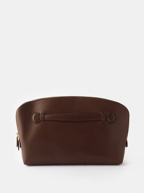 The Row Ellie Clutch Bag in Saddle Leather