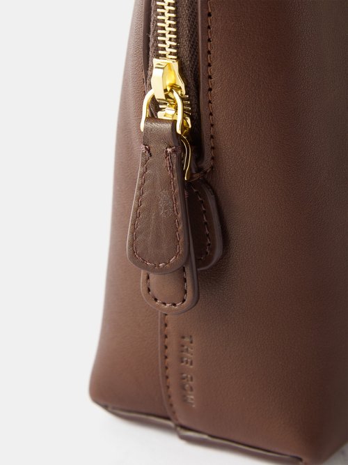 The Row Ellie Clutch Bag in Saddle Leather