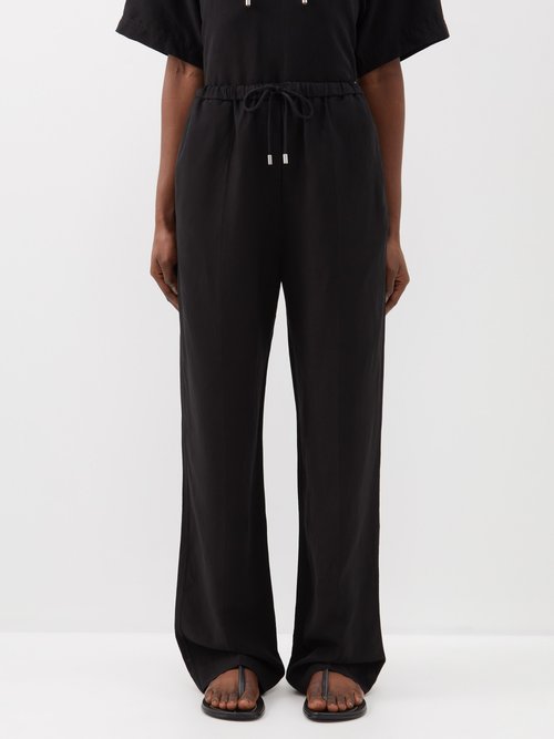 Toteme - Drawstring-waist Lyocell-blend Trousers - Womens - Black