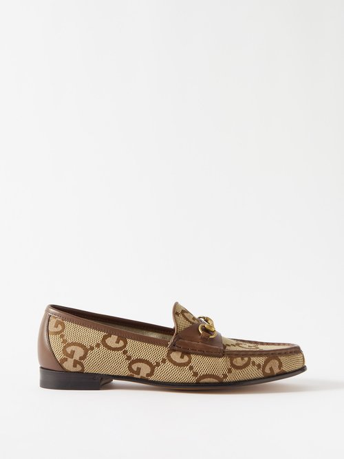 Gucci Leather-trimmed Maxi Gg Canvas Loafers In Brown
