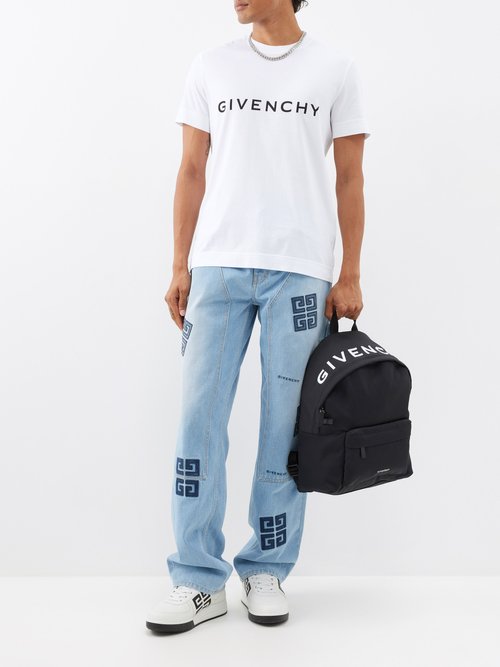 GIVENCHY Distressed denim and satin straight-leg pants