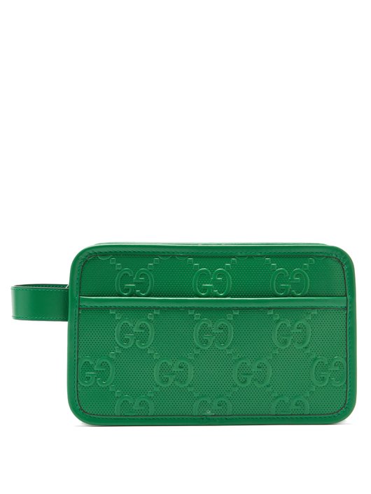 GG Monogram leather wash bag