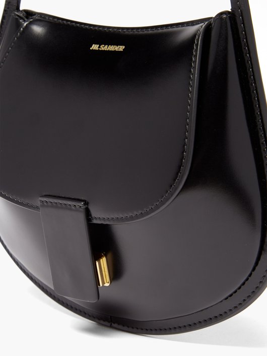 Logo-embossed mini leather shoulder bag