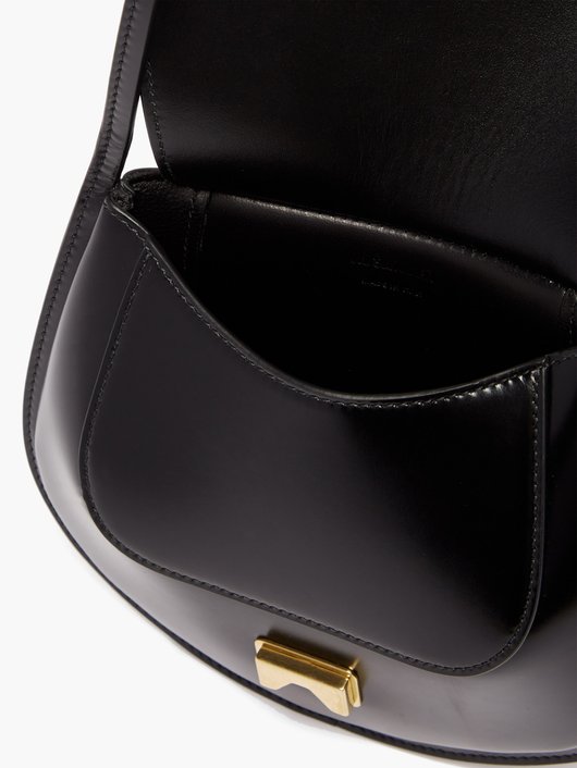 Logo-embossed mini leather shoulder bag