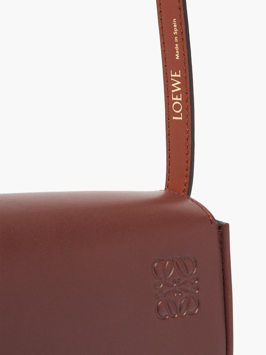 Heel leather cross-body bag