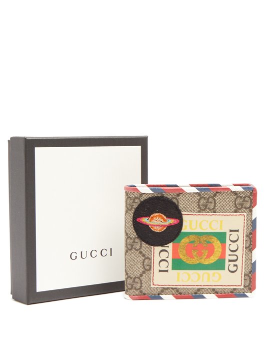 Gucci GG Supreme logo and planet-patch wallet